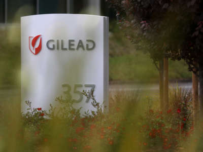 A sign is posted in front of the Gilead Sciences headquarters on April 29, 2020 in Foster City, California.