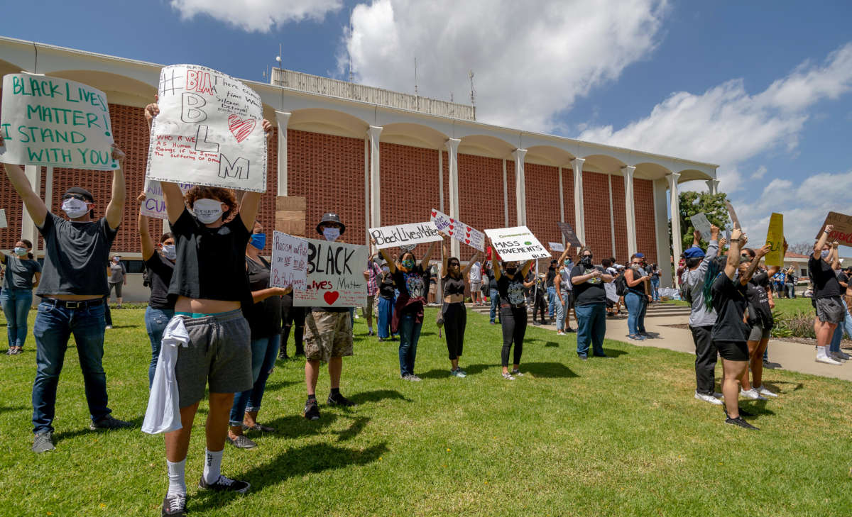 CSUF students and others join a peaceful protest over George Floyd's death at City Hall in Fullerton on June 7, 2020.