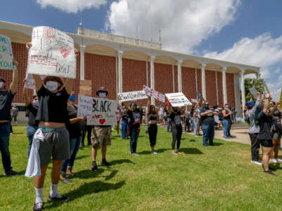 CSUF students and others join a peaceful protest over George Floyd's death at City Hall in Fullerton on June 7, 2020.