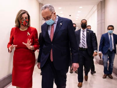 Nancy Pelosi and Chuck Schumer talk to eachother, probably about how best to disappoint us all