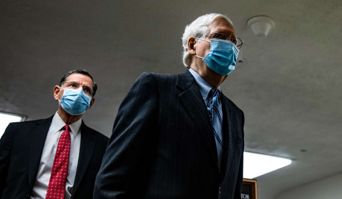 Senate Minority Leader Mitch McConnell walks through the Senate subway on his way to the fourth day of the Senates second impeachment trial of former President Trump at the U.S. Capitol on February 12, 2021, in Washington, D.C.