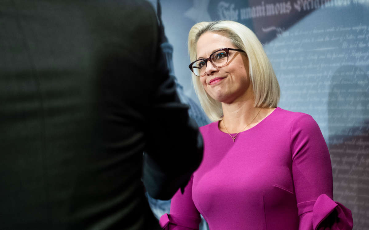 Sen. Kyrsten Sinema attends a news conference in the Capitol on December 4, 2019.