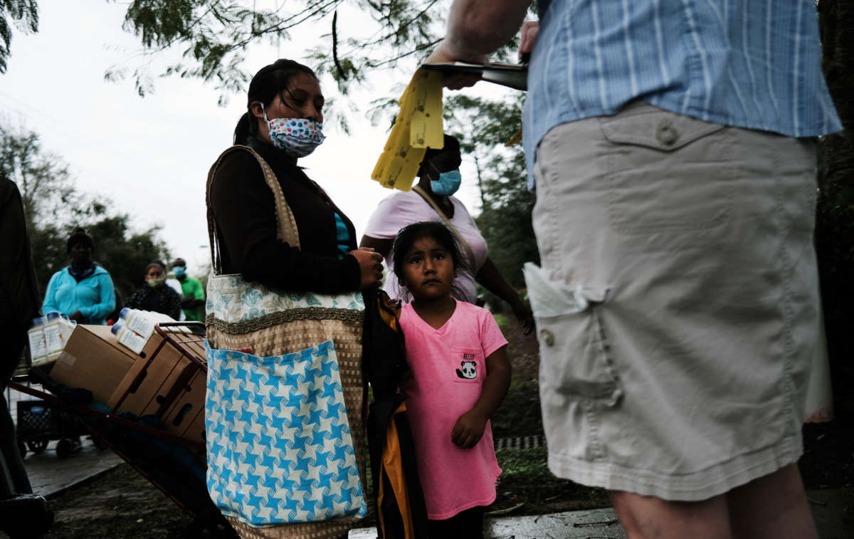 Food is distributed during a mobile food pantry on February 16, 2021, in Immokalee, Florida.