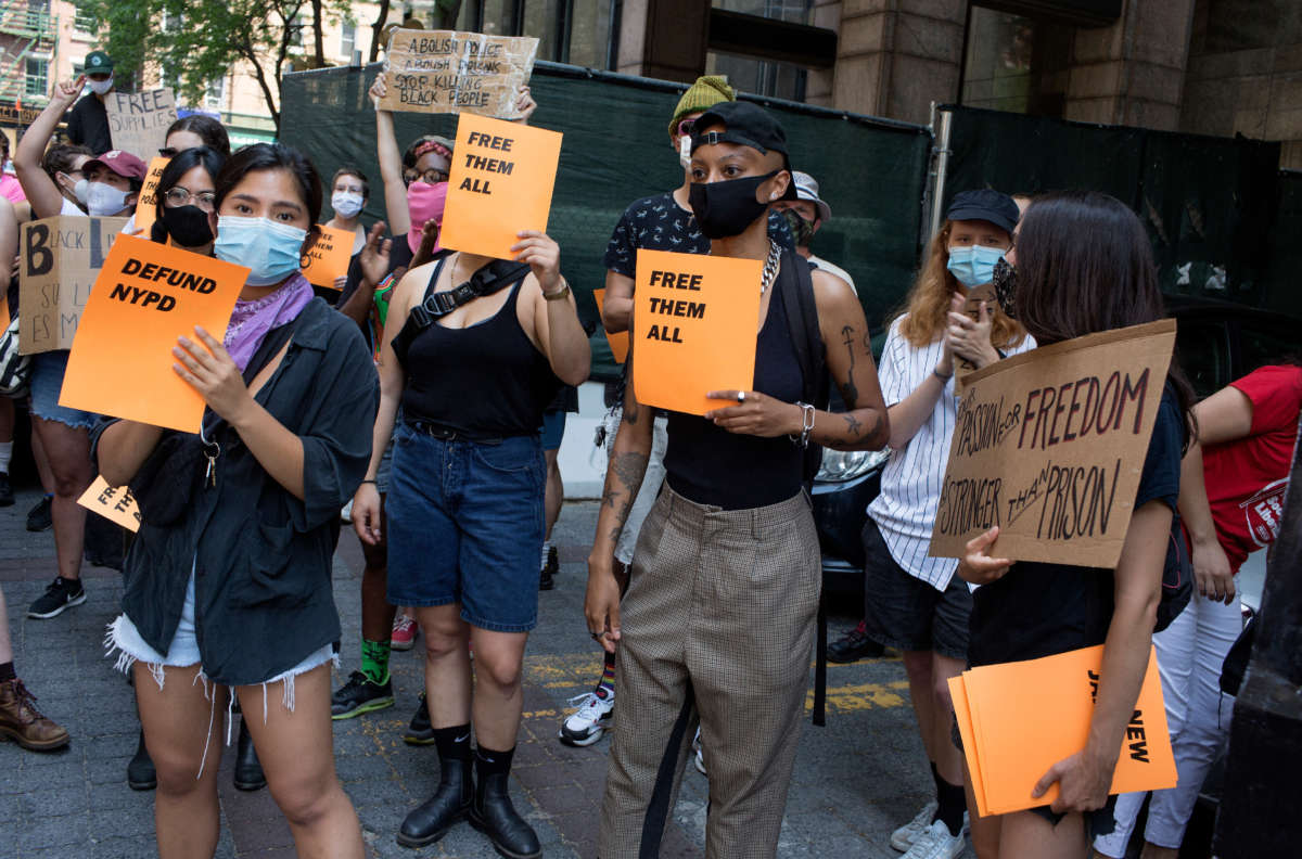 Black Lives Matter activists hold a protest rally calling for the abolishment of all jails and prisons outside The Tombs, the Manhattan jail now formally renamed the Manhattan Detention Complex, on June 20, 2020, in downtown New York City.
