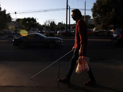 Will Butler walks home from the grocery store from his home in Silverlake on January 21, 2021, in Los Angeles, California. The pandemic has brought increased challenges to navigating himself around the city.