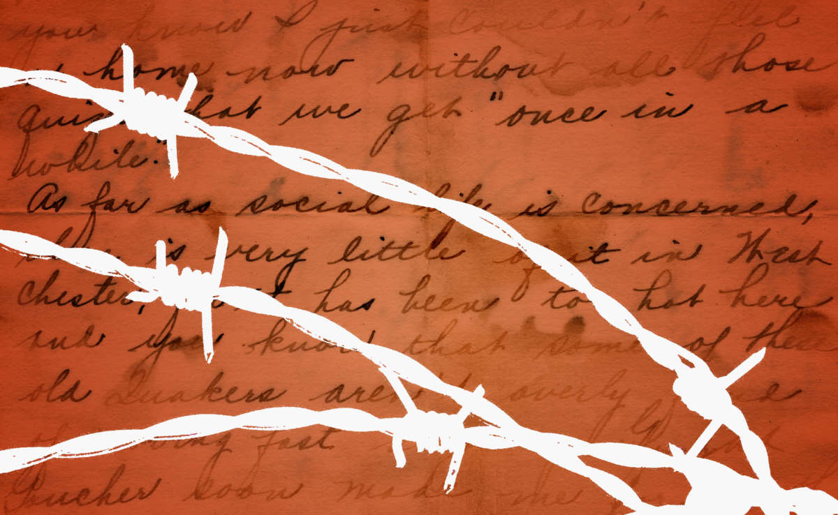 Barbed wire over a handwritten letter, mail