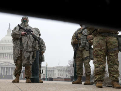 National Guard troops stand outside the U.S. Capitol on February 13, 2021, in Washington, D.C.