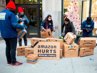 Amazon workers and community allies demonstrate during a protest in front of CEO Jeff Bezos's Manhattan residence on December 2, 2020.