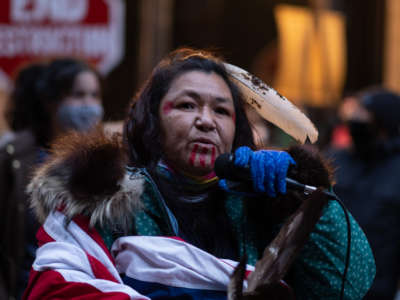 Tania Aubid, a longstanding activist and member of the Mille Lacs Band of Ojibwe, speaks to protesters about the environmental and human risks of allowing Enbridge Line 3 pipeline to be built across Northern Minnesota, in St. Paul, Minnesota, on January 29, 2021.