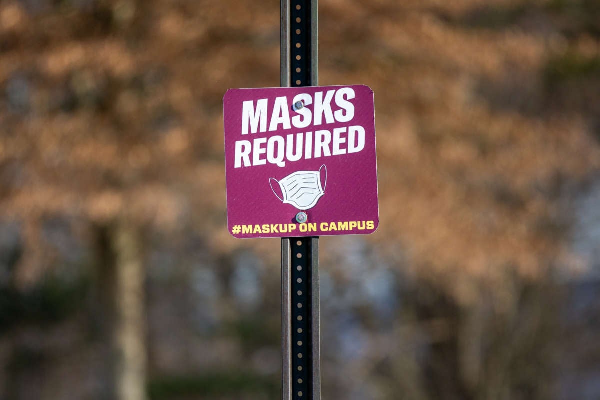 A sign alerting people that masks are required on campus seen at Bloomsburg University, in Bloomsberg, Pennsylvania, on February 6, 2021.