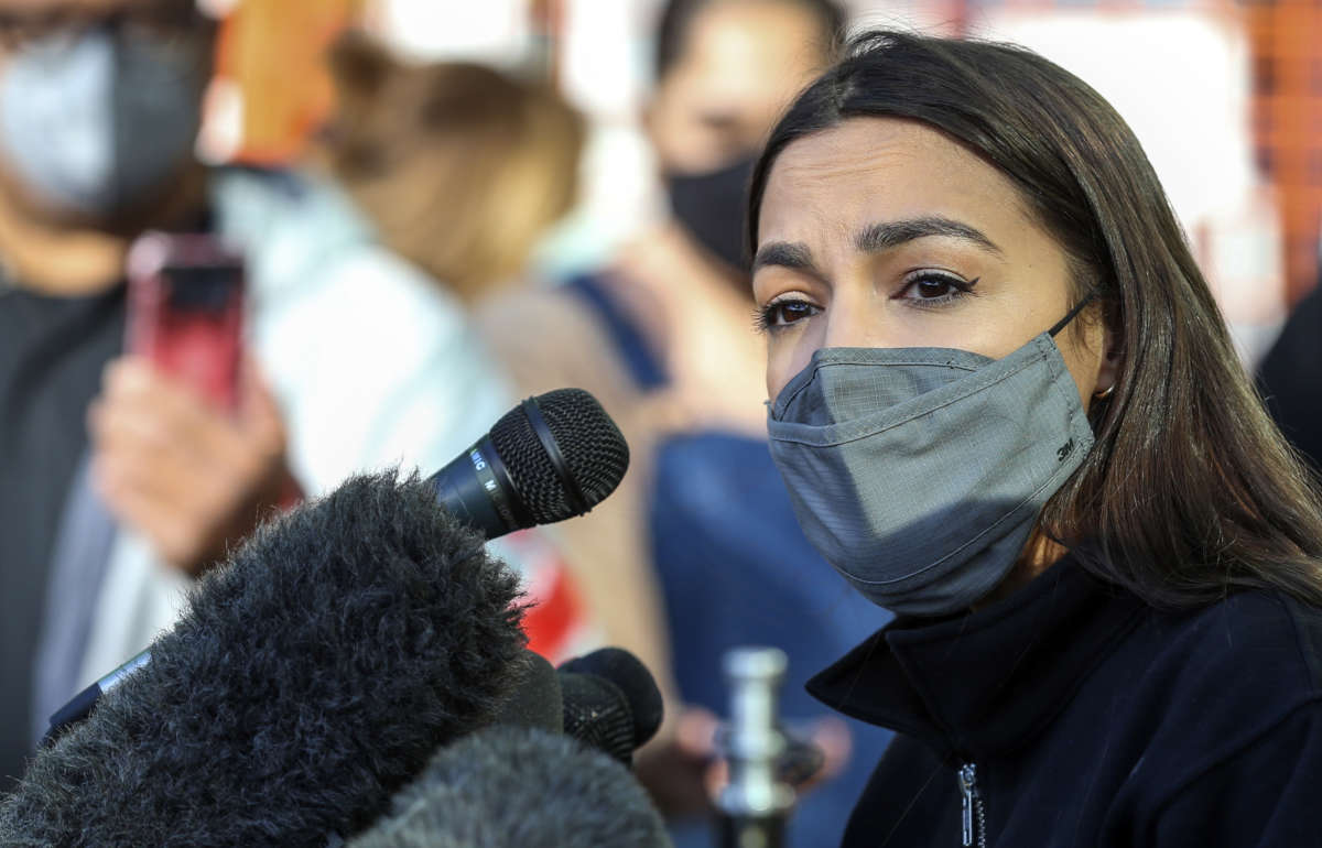 Congresswoman Alexandria Ocasio-Cortez speaks to the media at the Houston Food Bank on February 20, 2021, in Houston, Texas.