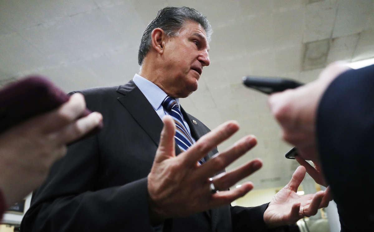 Sen. Joe Manchin speaks to reporters before walking into the U.S. Capitol on January 25, 2020, in Washington, D.C.