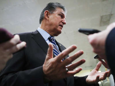 Sen. Joe Manchin speaks to reporters before walking into the U.S. Capitol on January 25, 2020, in Washington, D.C.