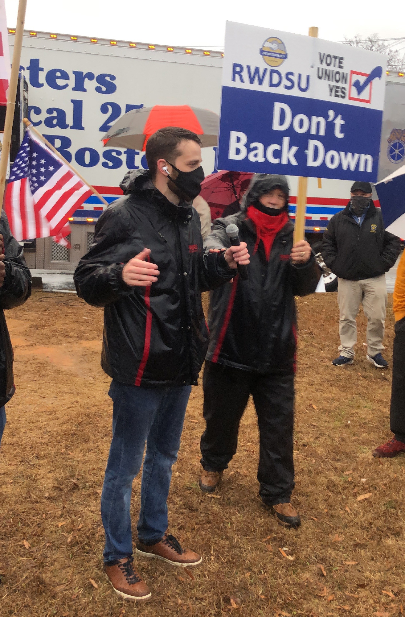  Retail, Wholesale and Department Store Union (RWDSU) lead organizer Joshua Brewer speaks in the rain at a rally in Bessemer, Alabama on February 6, 2021. 