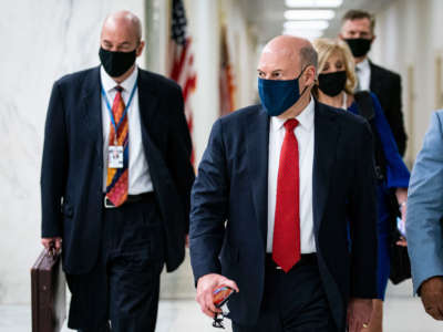 U.S. Postal Service Postmaster General Louis DeJoy departs following a House Oversight and Reform Committee hearing on Capitol Hill on February 24, 2021, in Washington, D.C.