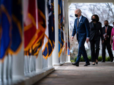 President Joe Biden walks out with Vice President Kamala Harris, Senate Majority Leader Chuck Schumer and House Speaker Nancy Pelosi to deliver remarks on the American Rescue Plan in the Rose Garden at the White House on March 12, 2021, in Washington, D.C.