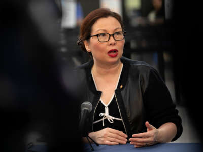 Sen. Tammy Duckworth speaks during a news conference at O'Hare International Airport in Chicago on January 7, 2019.