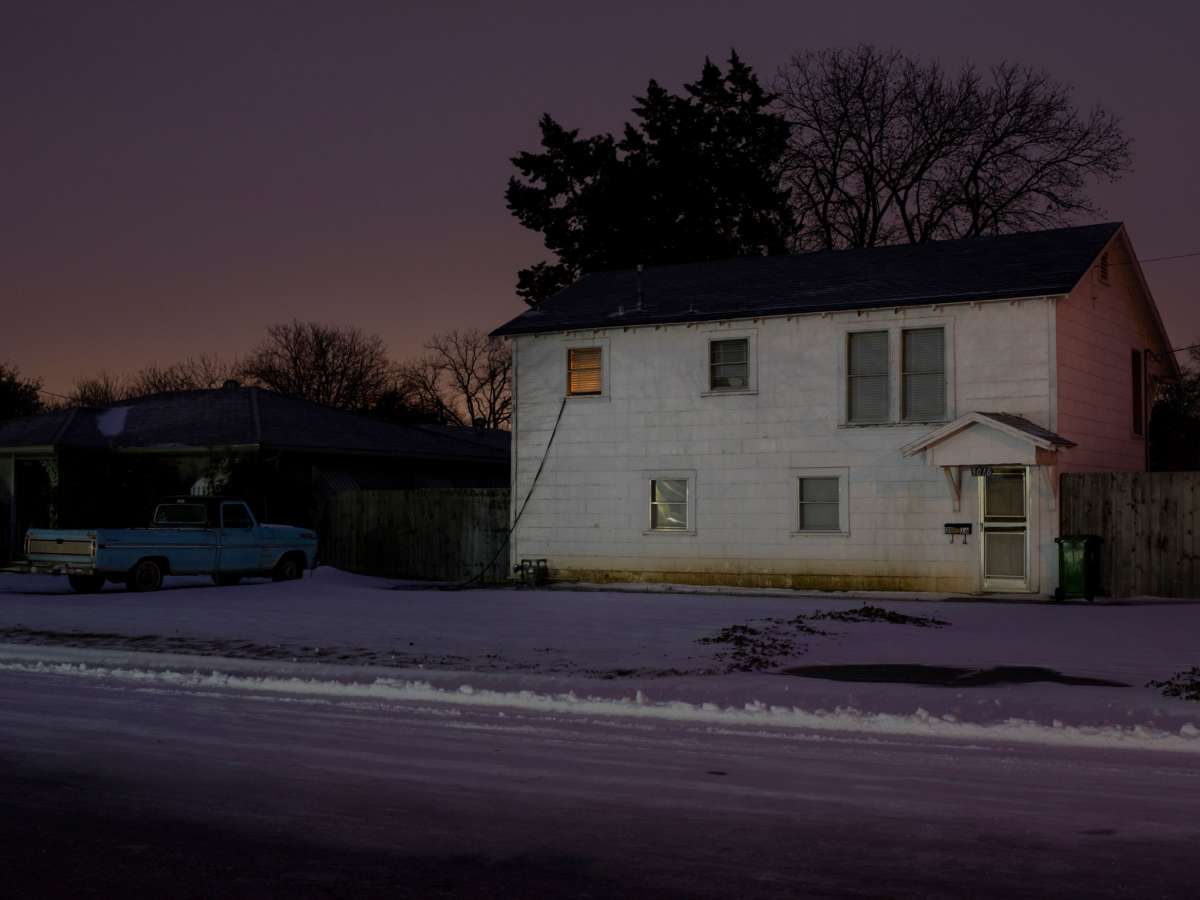 A light is seen from a house in Waco, Texas, as severe winter weather conditions over the last few days has forced road closures and power outages over the state on February 17, 2021.