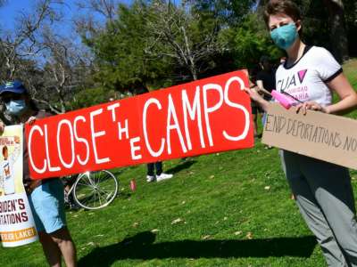 Activists gather for a "Reunite Our Families Now" rally in Los Angeles, California, on March 6, 2021, to protest continued deportations under President Joe Biden, urging that ICE (Immigration and Customs Enforcement) be abolished and calling for the closure of camps where immigrants are being held.