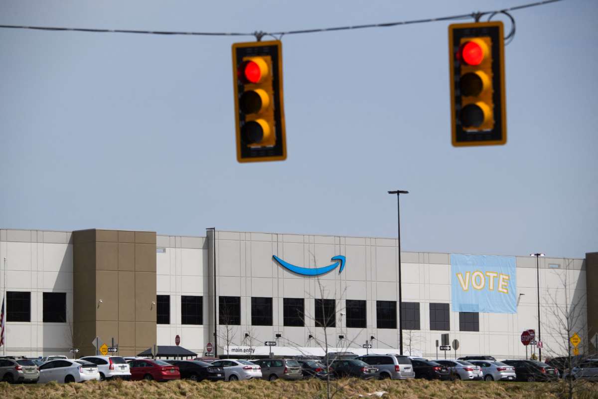 Traffic lights at an intersection outside the Amazon.com, Inc. fulfillment center in Bessemer, Alabama, on March 26, 2021.