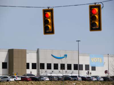 Traffic lights at an intersection outside the Amazon.com, Inc. fulfillment center in Bessemer, Alabama, on March 26, 2021.