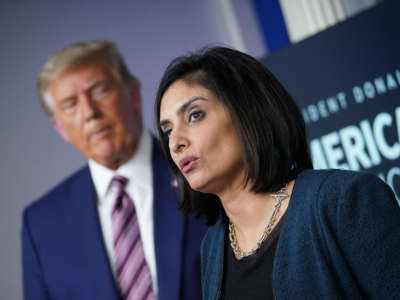 Seema Verma, administrator of the Centers for Medicare and Medicaid Services, speaks as President Trump listens on November 20, 2020, in the Brady Briefing Room of the White House in Washington, D.C.