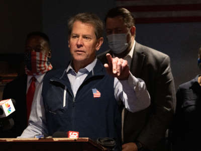 Georgia Gov. Brian Kemp speaks at a news conference about the state's new Election Integrity Law at AJ’s Famous Seafood and Poboys on April 10, 2021, in Marietta, Georgia.