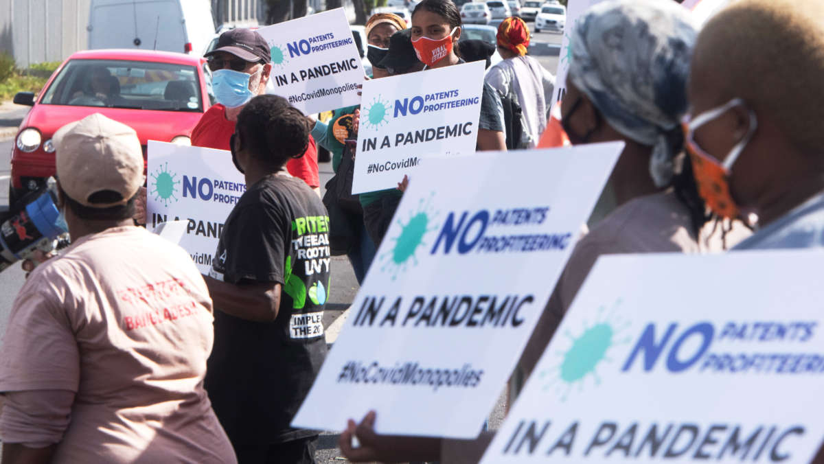 Protesters picket outside Johnson & Johnson offices during the "Global Day of Action for a People's Vaccine" on March 11, 2021, in Cape Town, South Africa.