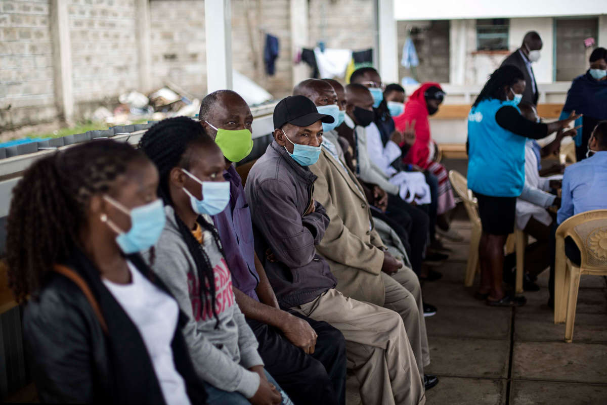 People wait to be vaccinated during Phase 1 of the COVID-19 vaccination program at Mbagathi Hospital, in Nairobi, Kenya, on April 12, 2021.