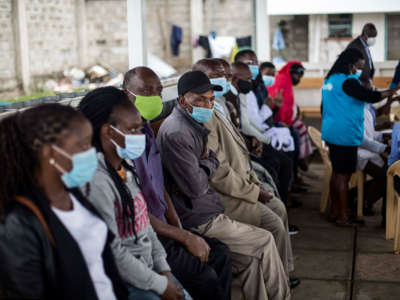 People wait to be vaccinated during Phase 1 of the COVID-19 vaccination program at Mbagathi Hospital, in Nairobi, Kenya, on April 12, 2021.