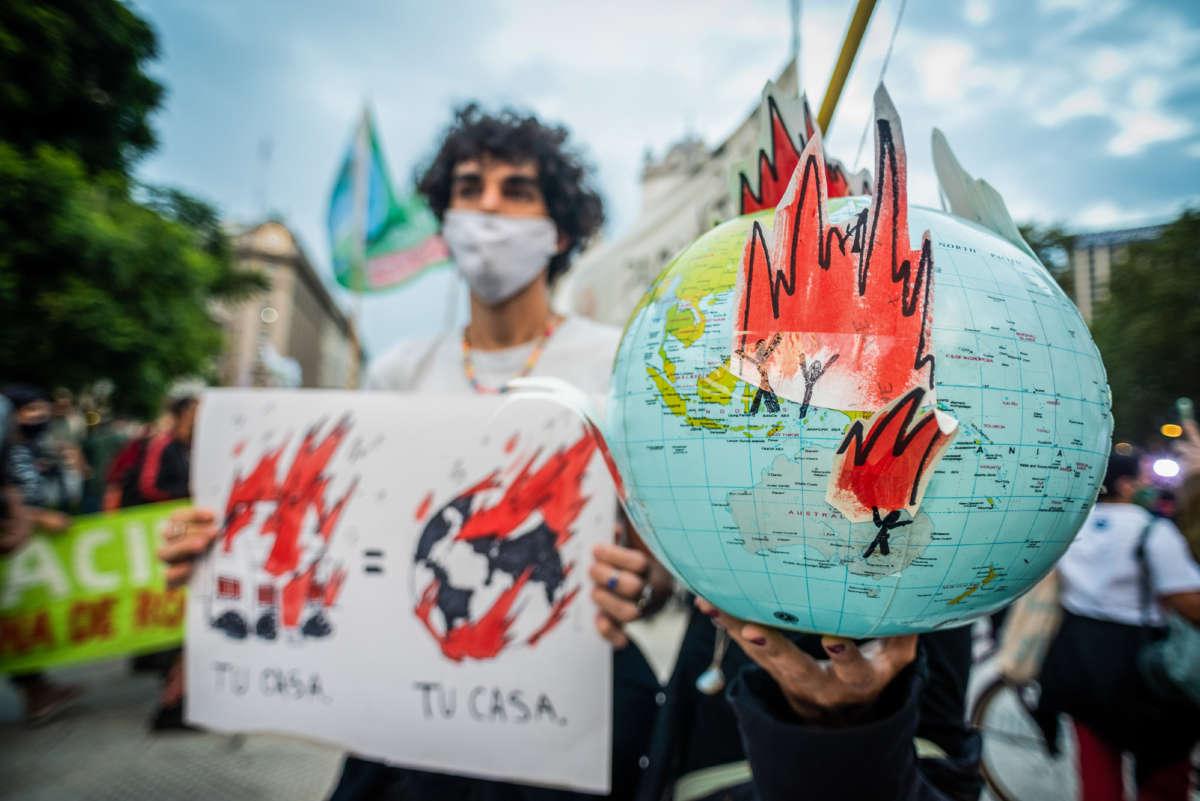 Protesters rally to raise awareness about climate change on March 22, 2021, in Buenos Aires, Argentina.