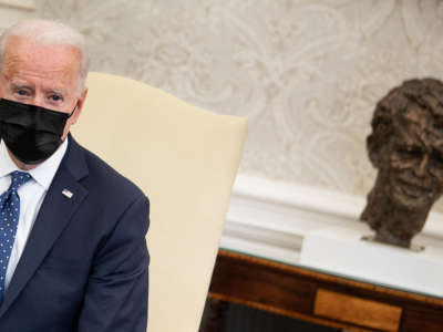 U.S. President Joe Biden speaks before a meeting with the Congressional Hispanic Caucus in the Oval Office of the White House April 20, 2021, in Washington, DC.