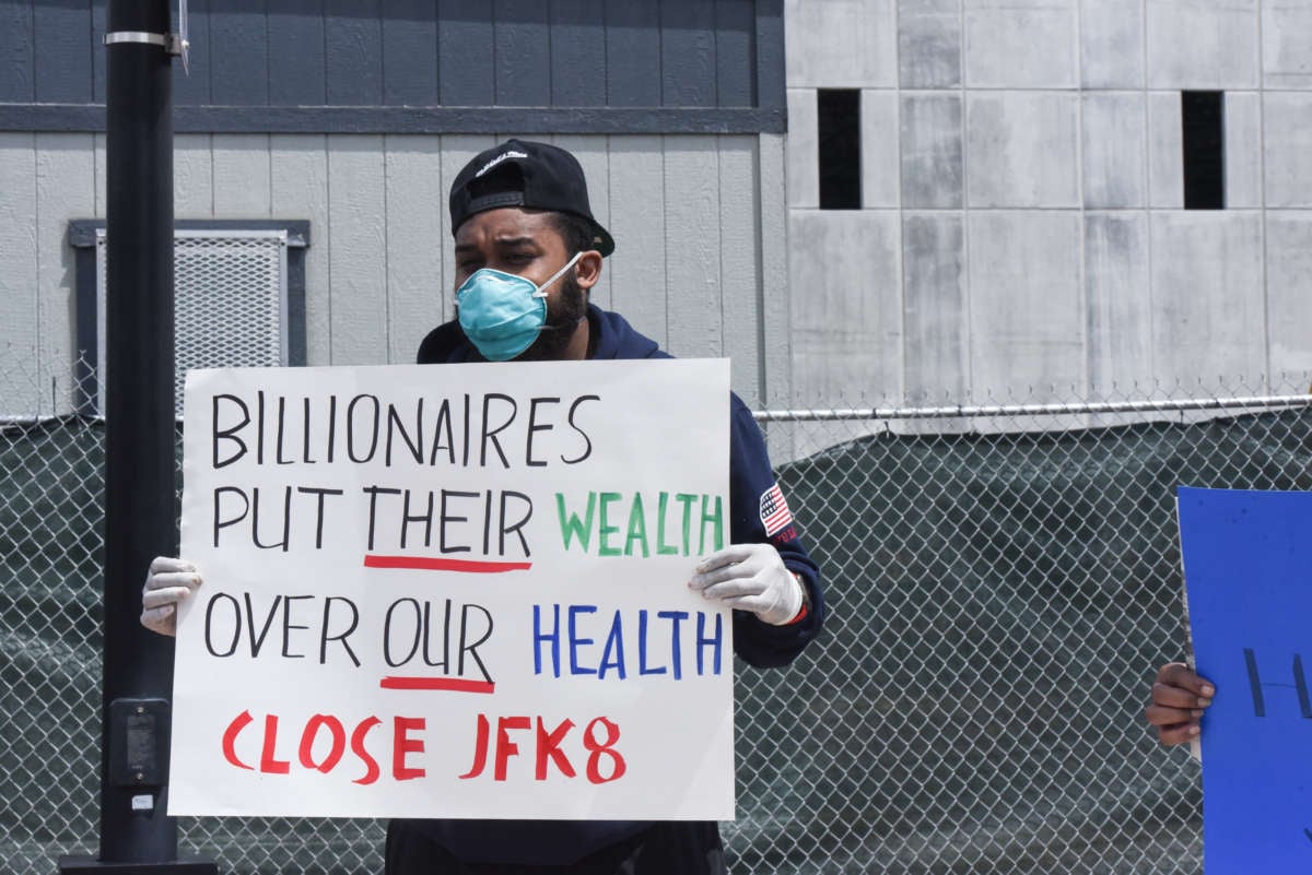 People protest working conditions outside of an Amazon warehouse fulfillment center on May 1, 2020, in the Staten Island borough of New York City. Workers at the facility are beginning an independent union drive.