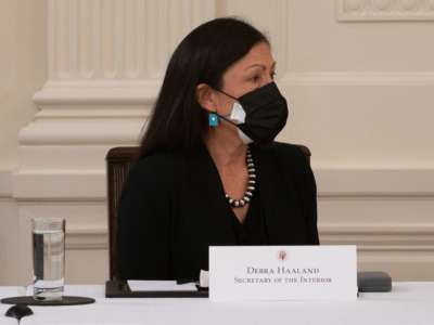 Interior Secretary Deb Haaland listens as President Joe Biden holds his first cabinet meeting in the East Room of the White House in Washington, D.C., on April 1, 2021.