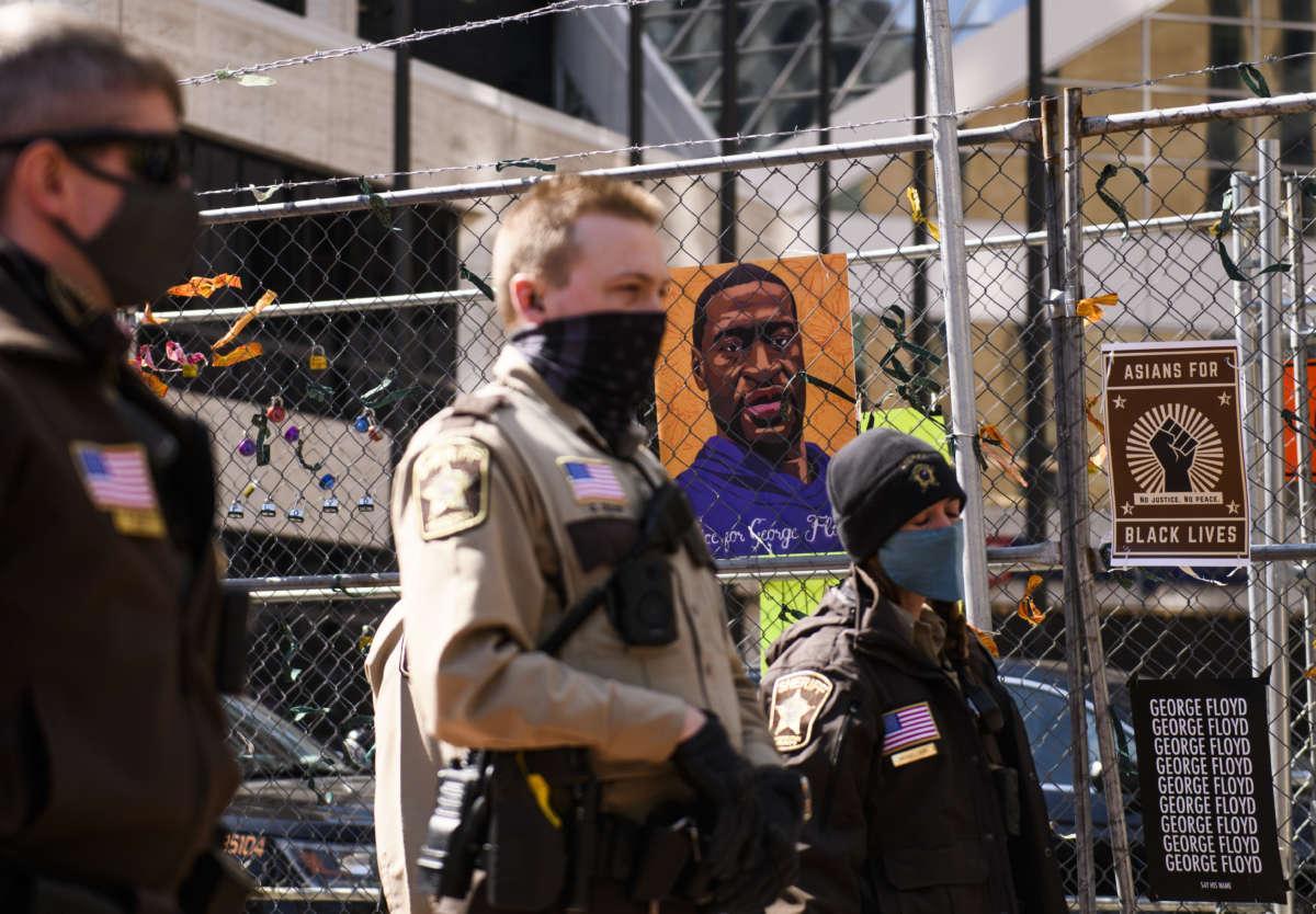 Law enforcement stands guard outside the Hennepin County Government Center, as the trial of former Minneapolis police officer Derek Chauvin continues inside, on April 2, 2021, in Minneapolis, Minnesota.