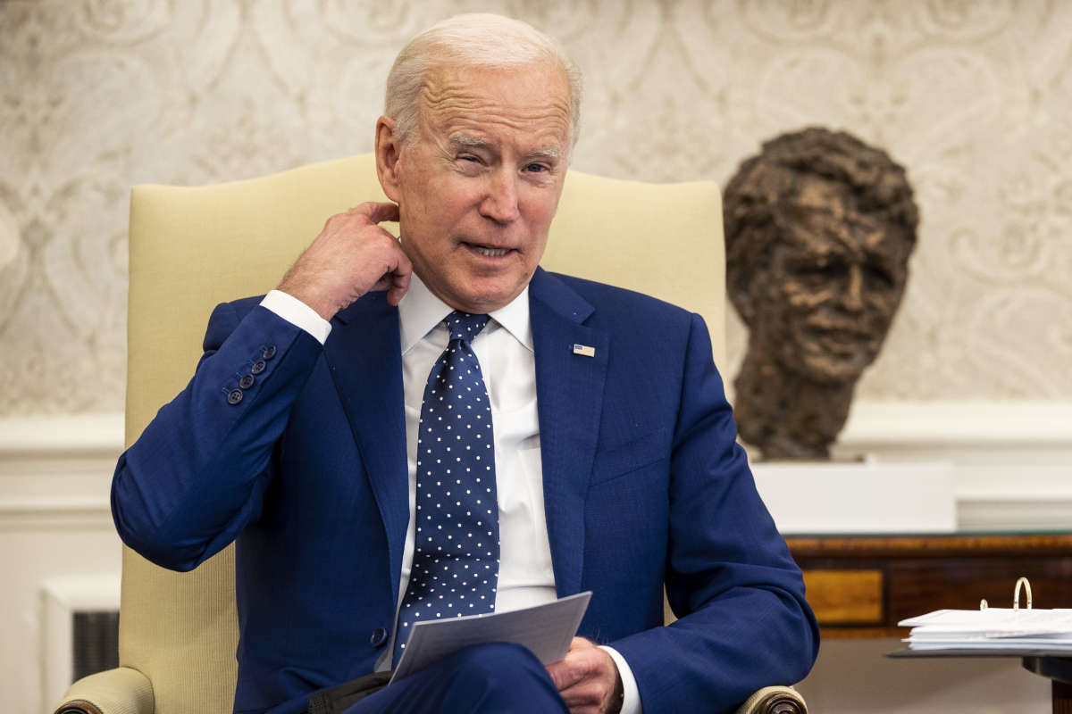 President Joe Biden meets with members of the Congressional Asian Pacific American Caucus Executive Committee in the Oval Office at the White House on April 15, 2021, in Washington, D.C.