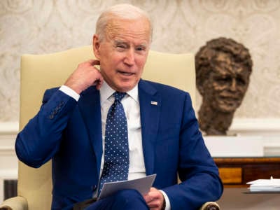 President Joe Biden meets with members of the Congressional Asian Pacific American Caucus Executive Committee in the Oval Office at the White House on April 15, 2021, in Washington, D.C.
