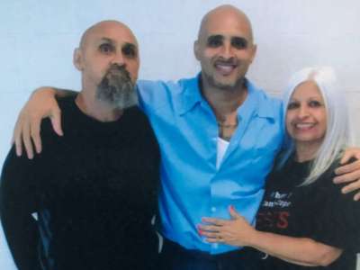 Esther and Rosendo Hernández visit with their son Juan Hernández at Lawrence Correctional Center in 2020 right before the pandemic when the Illinois Department of Corrections shut down visits.