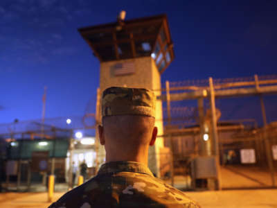 A U.S. Army soldier stands outside the entrance of the "Gitmo" detention center on October 22, 2016, at the U.S. Naval Station at Guantánamo Bay, Cuba.