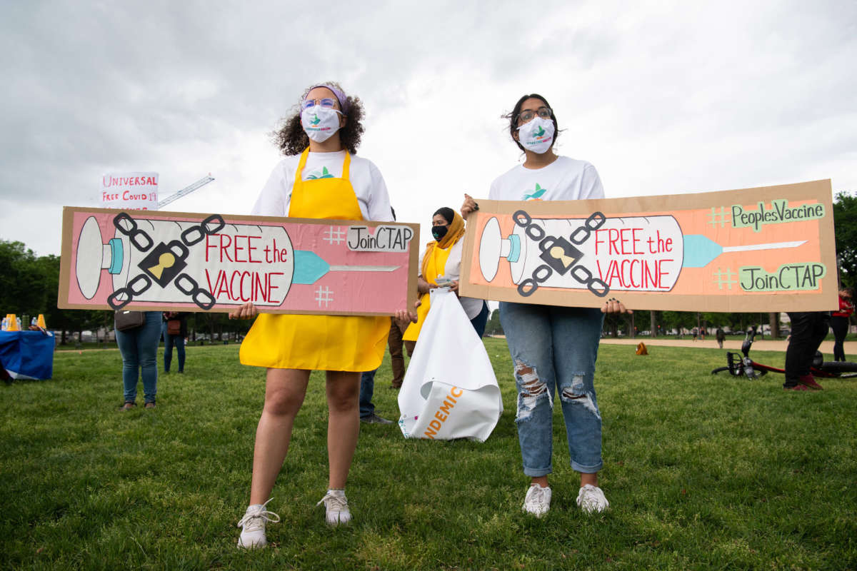 Demonstrators hold a rally to "Free the Vaccine," calling on the U.S. to commit to a global coronavirus vaccination plan that includes sharing vaccine formulas with the world to help ensure that every nation has access to a vaccine, on the National Mall in Washington, D.C., May 5, 2021.