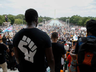 Thousands gather for the "Get Your Knee Off Our Necks" march on the anniversary of the 1963 Civil Rights March On Washington, at the Lincoln Memorial, in Washington, D.C., on August 28, 2020.