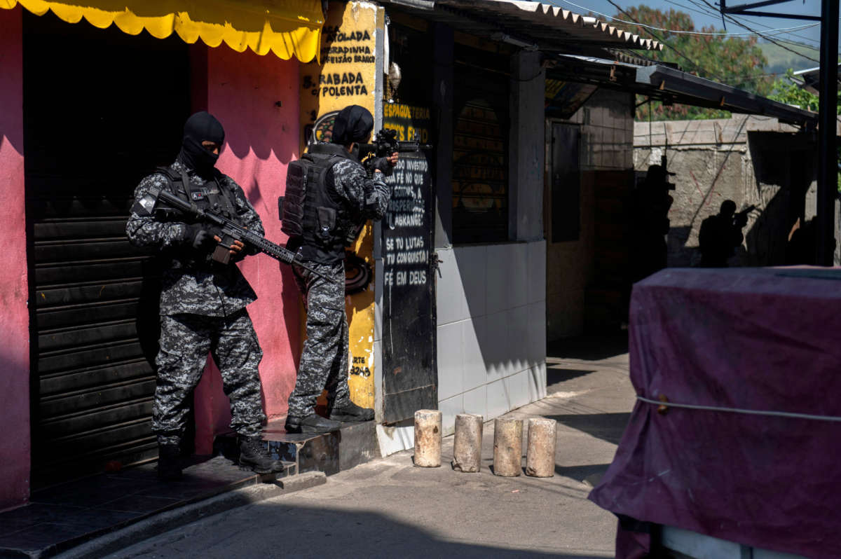 Civil Police officers take part in an operation against alleged drug traffickers at the Jacarezinho favela in Rio de Janeiro, Brazil, on May 6, 2021.