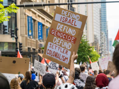 People protest in solidarity with Palestinian liberation on May 16, 2021, in Chicago.