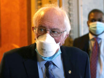 Sen. Bernie Sanders (I-Vermont) passes through a hallway at the U.S. Capitol March 5, 2021 in Washington, DC.