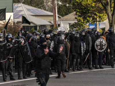 Counterprotesters approach Trump supporters, including Proud Boys, during a rally on December 12, 2020, in Olympia, Washington.