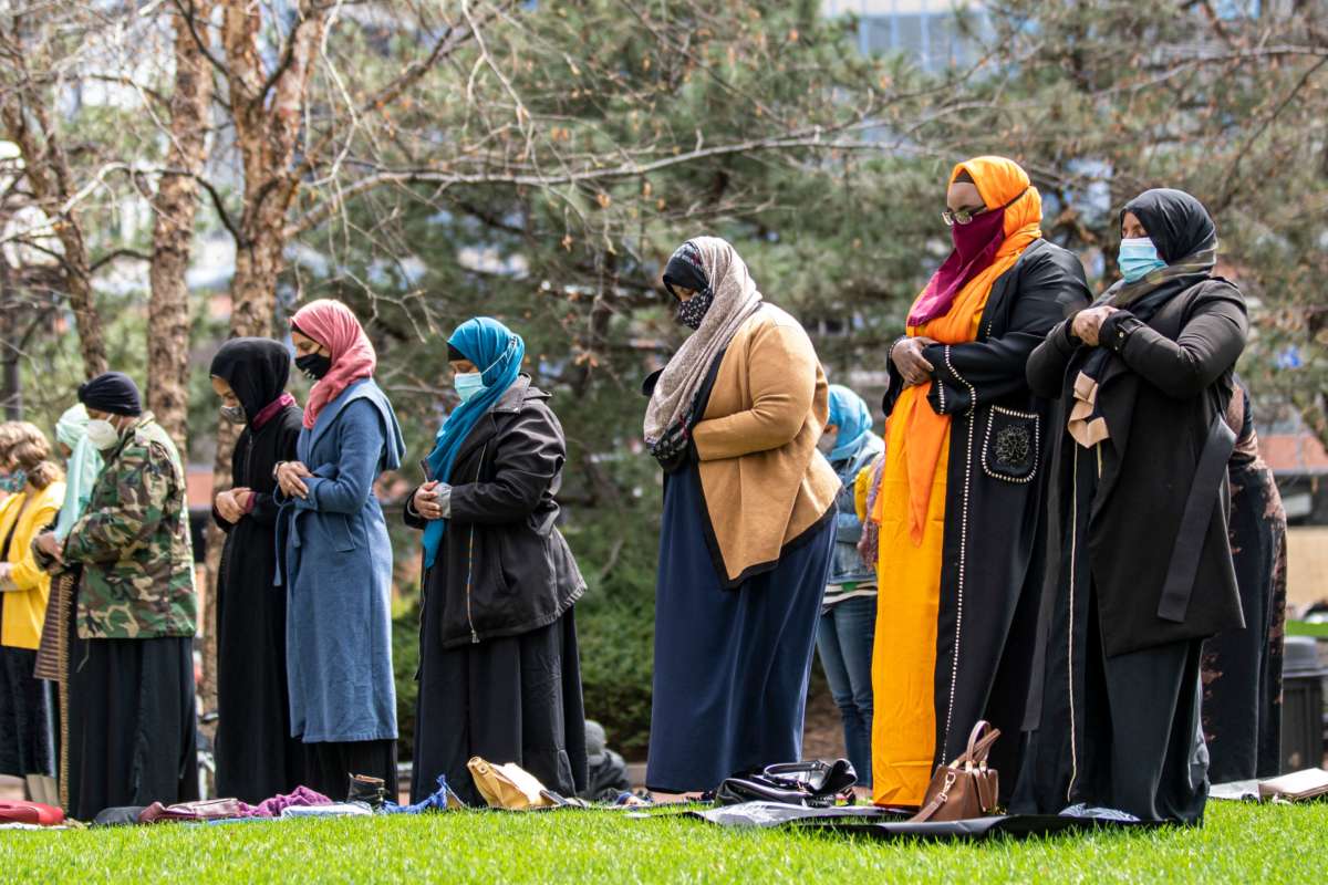 People attend the first Friday prayers of the Islamic holy month of Ramadan outside the Hennepin County Government Center in Minneapolis, Minnesota on April 16, 2021. Makram El-Amin called for justice for those that were lost to police violence in the Friday sermon.
