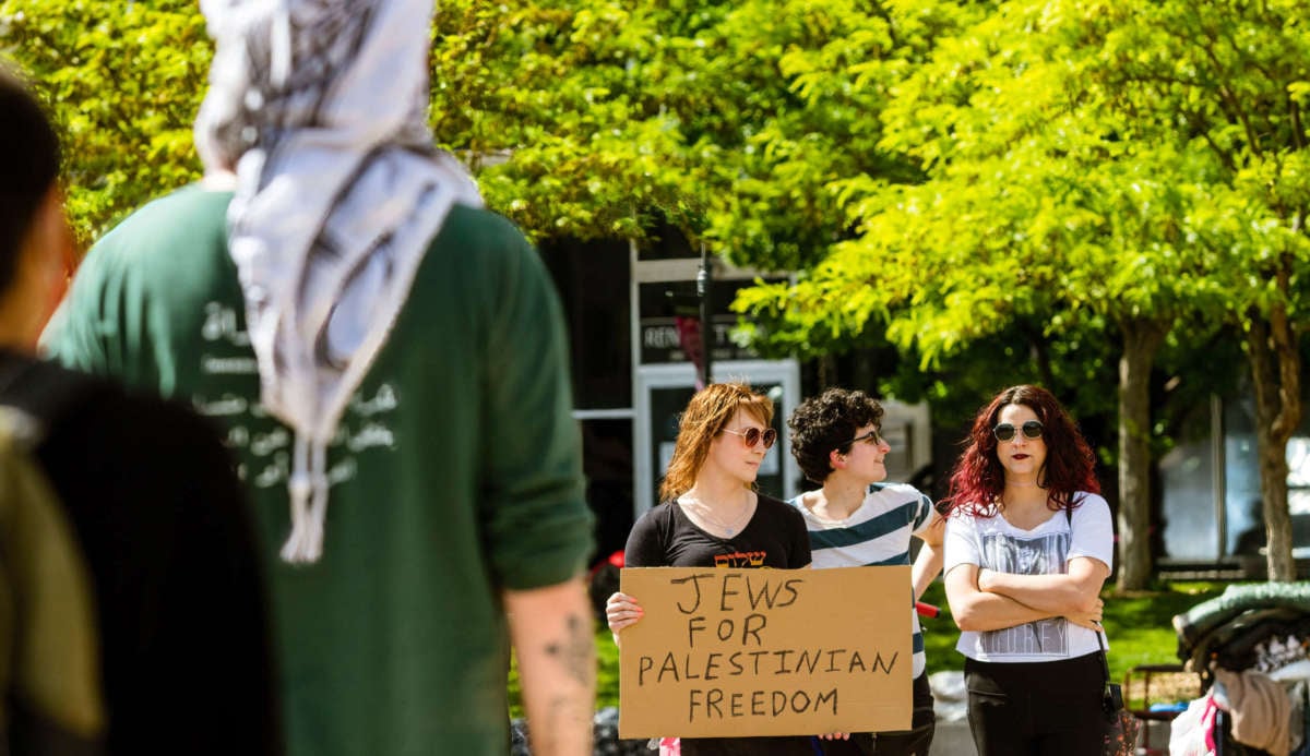 A protestor holds a placard saying "Jews for Palestinian freedom" during a demonstration in Reno, Nevada, on May 16, 2021.