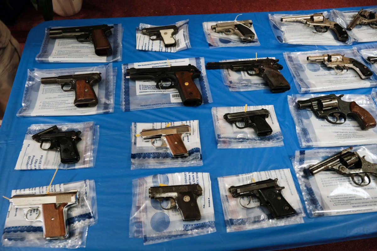 Guns are displayed on a table during a gun buy-back event at a church in Staten Island on April 24, 2021, in New York City.