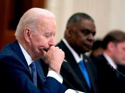 President Joe Biden listens during a meeting in the White House on May 21, 2021.