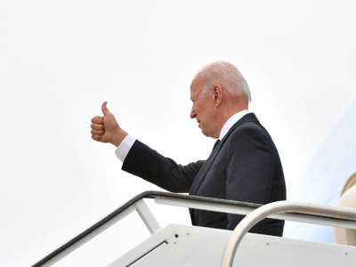 President Joe Biden boards Air Force One before departing from Tulsa International Airport in Tulsa, Oklahoma, on June 1, 2021.